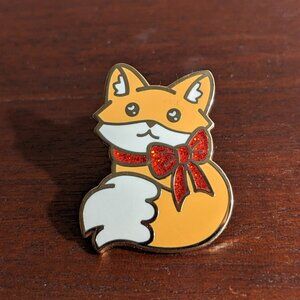 Fox with red bow enamel pin
